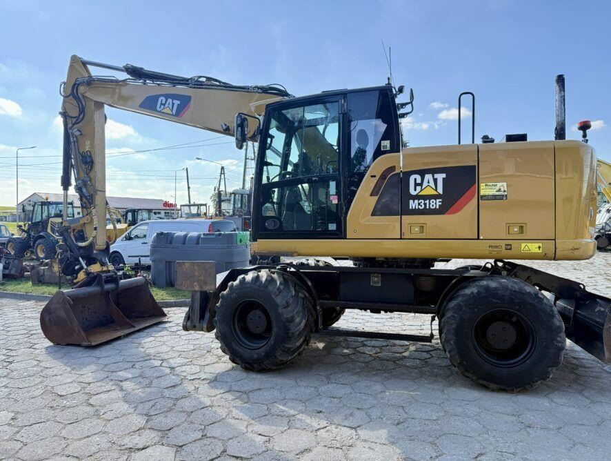 CAT M318F - Grävmaskin på däck: bild 1 CAT M318F - Grävmaskin på däck: bild 1