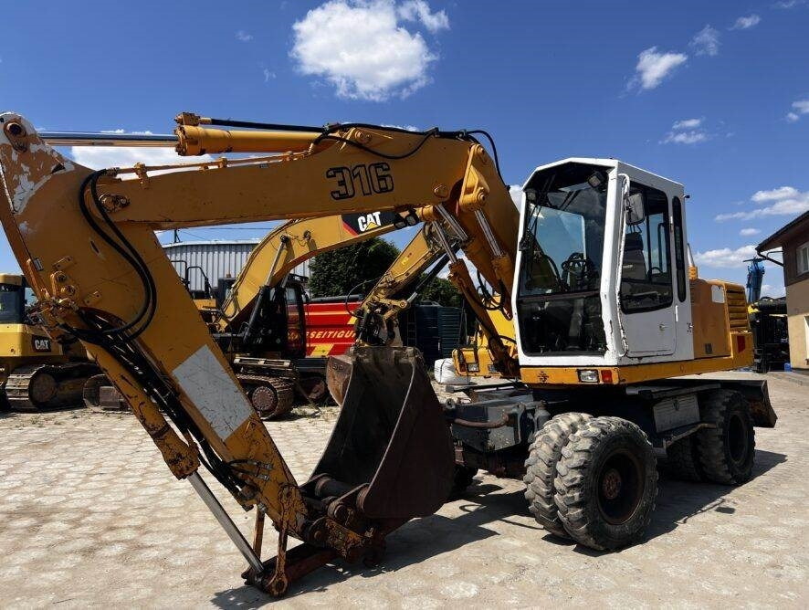 Liebherr A316 - Grävmaskin på däck: bild 1 Liebherr A316 - Grävmaskin på däck: bild 1