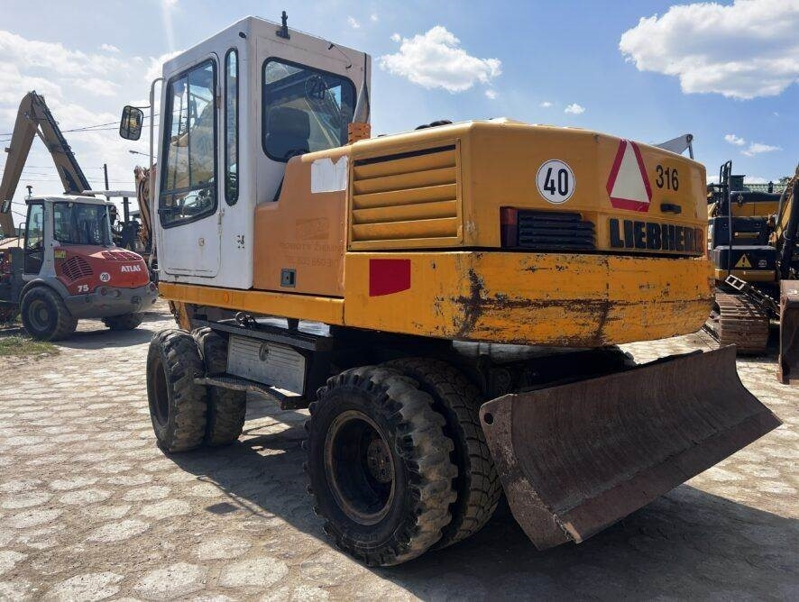 Liebherr A316 - Grävmaskin på däck: bild 3 Liebherr A316 - Grävmaskin på däck: bild 3
