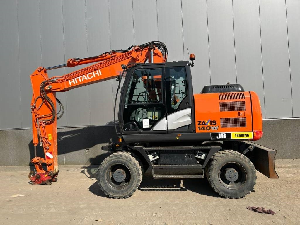 Hitachi ZX 140 W-5B - Grävmaskin på däck: bild 1 Hitachi ZX 140 W-5B - Grävmaskin på däck: bild 1