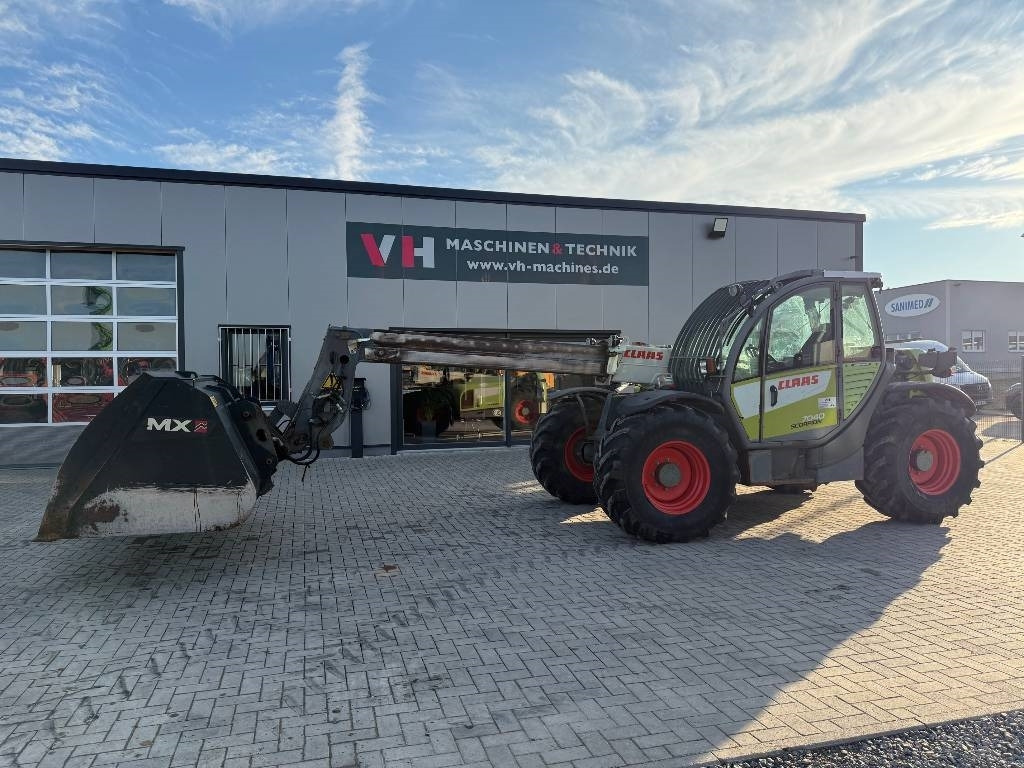 Claas 7040 - Teleskoplastar: bild 1 Claas 7040 - Teleskoplastar: bild 1