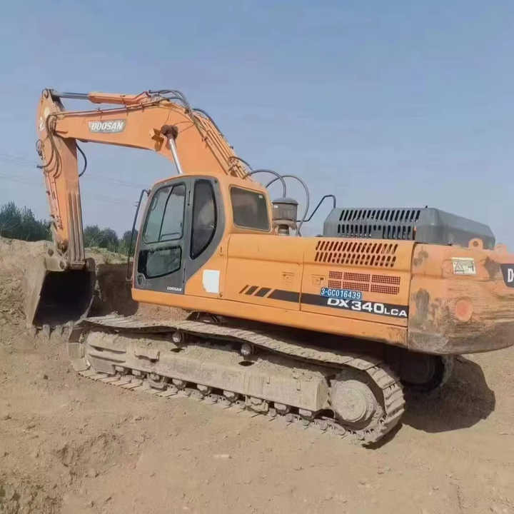 Used Original Korea Doosan 34 Ton Excavator with Cheap Price and Good Condition DOOSAN Dx340LCA Dx225 Dx330 DX360for Sale - Bandgrävare: bild 1 Used Original Korea Doosan 34 Ton Excavator with Cheap Price and Good Condition DOOSAN Dx340LCA Dx225 Dx330 DX360for Sale - Bandgrävare: bild 1