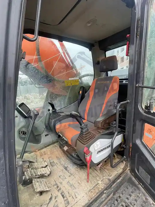 Well-Maintained Used Doosan excavator DX520LC-9C in good condition for sale - Bandgrävare: bild 5 Well-Maintained Used Doosan excavator DX520LC-9C in good condition for sale - Bandgrävare: bild 5