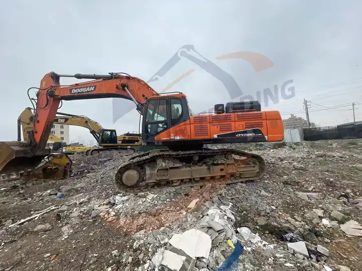 Low price Used Doosan excavator DX520LC-9C in good condition for sale - Bandgrävare: bild 5 Low price Used Doosan excavator DX520LC-9C in good condition for sale - Bandgrävare: bild 5