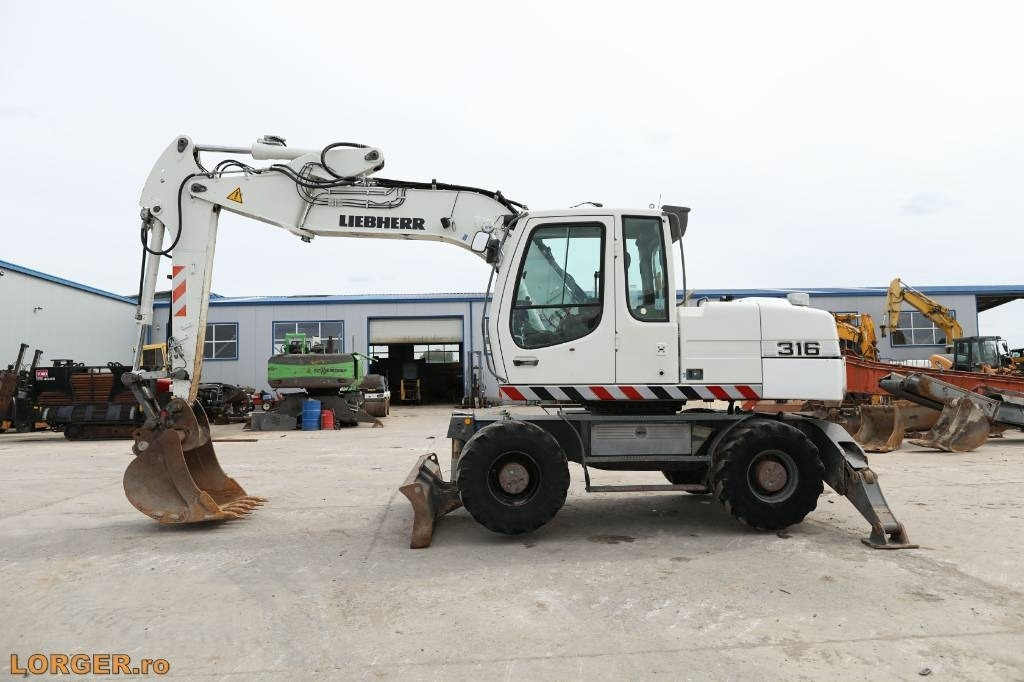 Liebherr A 316 Litronic - Grävmaskin på däck: bild 4 Liebherr A 316 Litronic - Grävmaskin på däck: bild 4