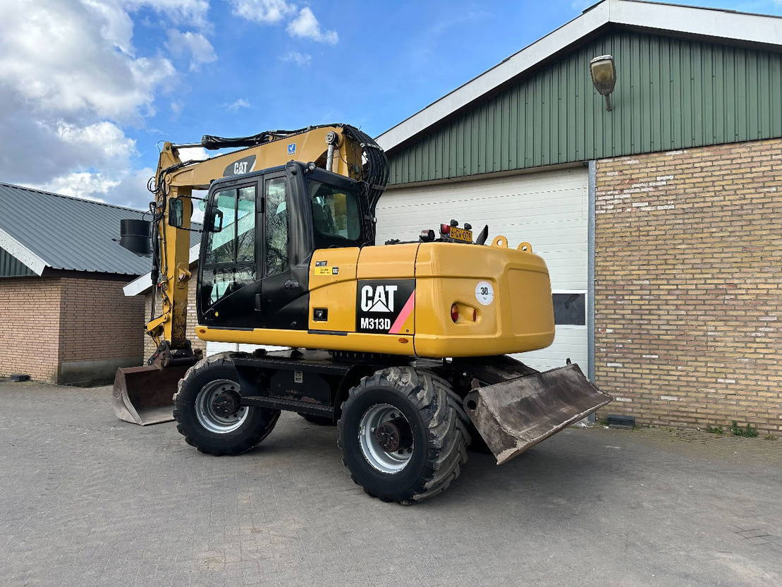 Caterpillar M313D - Grävmaskin på däck: bild 2 Caterpillar M313D - Grävmaskin på däck: bild 2