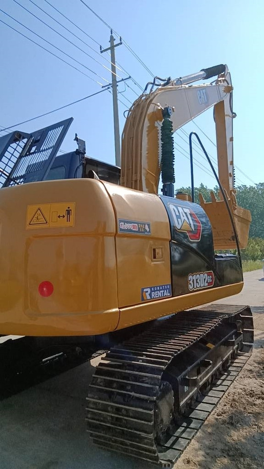 CAT 313 D - Grävmaskin på däck: bild 1 CAT 313 D - Grävmaskin på däck: bild 1