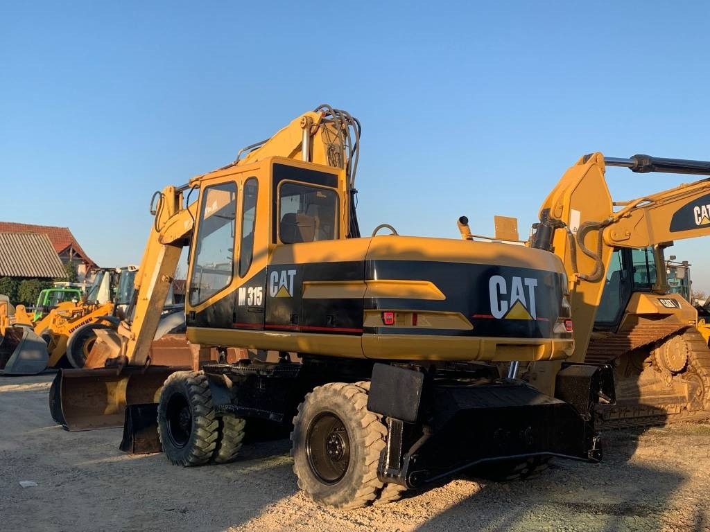 CAT M 315 - Grävmaskin på däck: bild 4 CAT M 315 - Grävmaskin på däck: bild 4