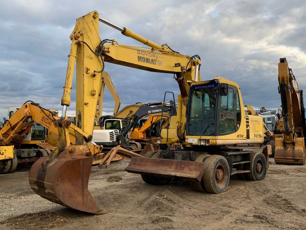 Komatsu PW 170 ES - Grävmaskin på däck: bild 1 Komatsu PW 170 ES - Grävmaskin på däck: bild 1
