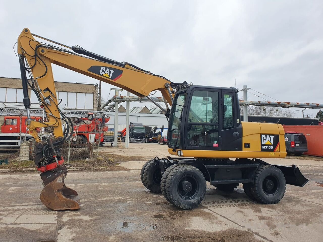 Caterpillar M 313 D Tiltrotator - Grävmaskin på däck: bild 2 Caterpillar M 313 D Tiltrotator - Grävmaskin på däck: bild 2