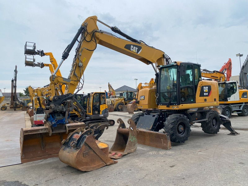 Caterpillar M314F NVT - Grävmaskin på däck: bild 1 Caterpillar M314F NVT - Grävmaskin på däck: bild 1