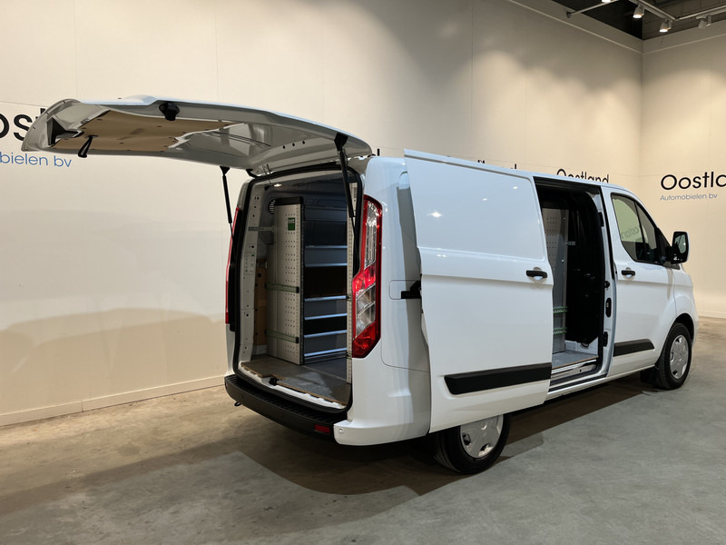 Ford Transit Custom 300 2.0 TDCI L1H1 Trend 130 PK / Servicebus / Bott Inrichting / Euro 6 / Schuifdeur L + R / Airco / CarPlay / Klep / PDC / Navigatie / 3-Zits / BPM VRIJ !! - Små skåpbil: bild 2 Ford Transit Custom 300 2.0 TDCI L1H1 Trend 130 PK / Servicebus / Bott Inrichting / Euro 6 / Schuifdeur L + R / Airco / CarPlay / Klep / PDC / Navigatie / 3-Zits / BPM VRIJ !! - Små skåpbil: bild 2