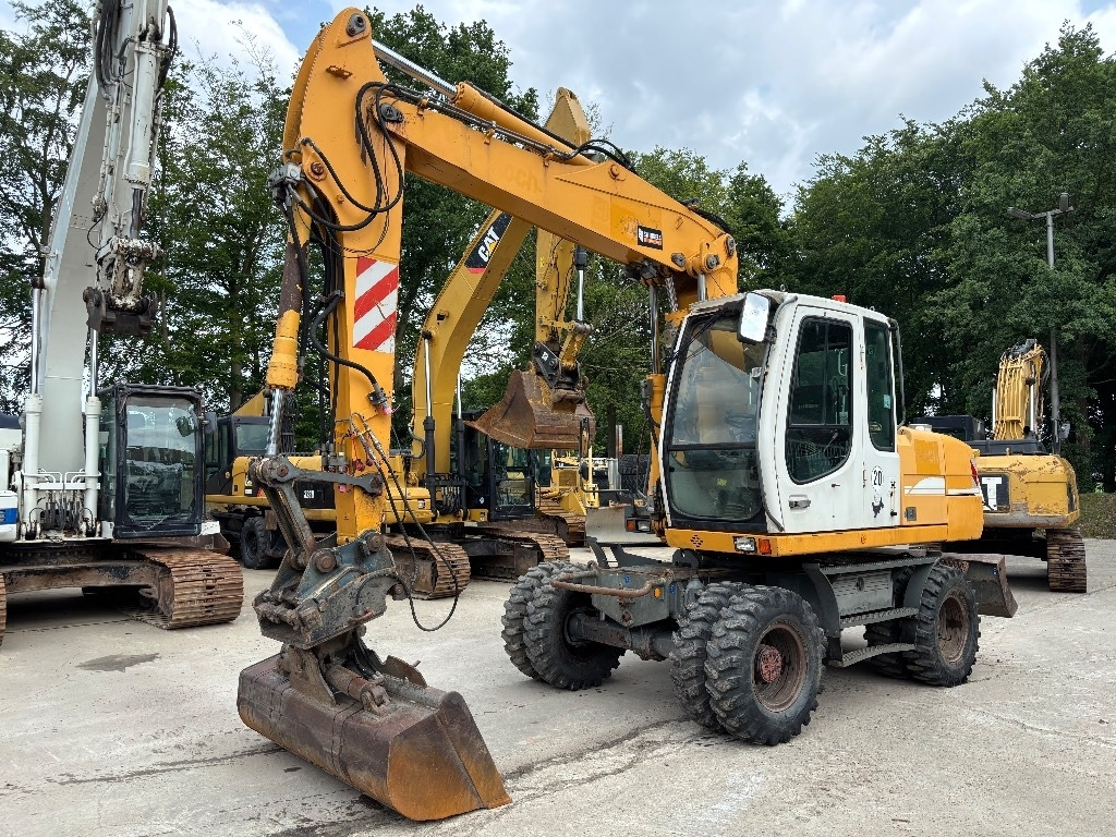 Liebherr A316 - Grävmaskin på däck: bild 1 Liebherr A316 - Grävmaskin på däck: bild 1