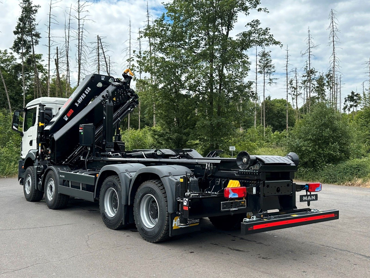MAN TGS 35.520 8x4 Abrollkipper + Kran HIAB 658E6 - Lastväxlare lastbil, Kranbil: bild 5 MAN TGS 35.520 8x4 Abrollkipper + Kran HIAB 658E6 - Lastväxlare lastbil, Kranbil: bild 5