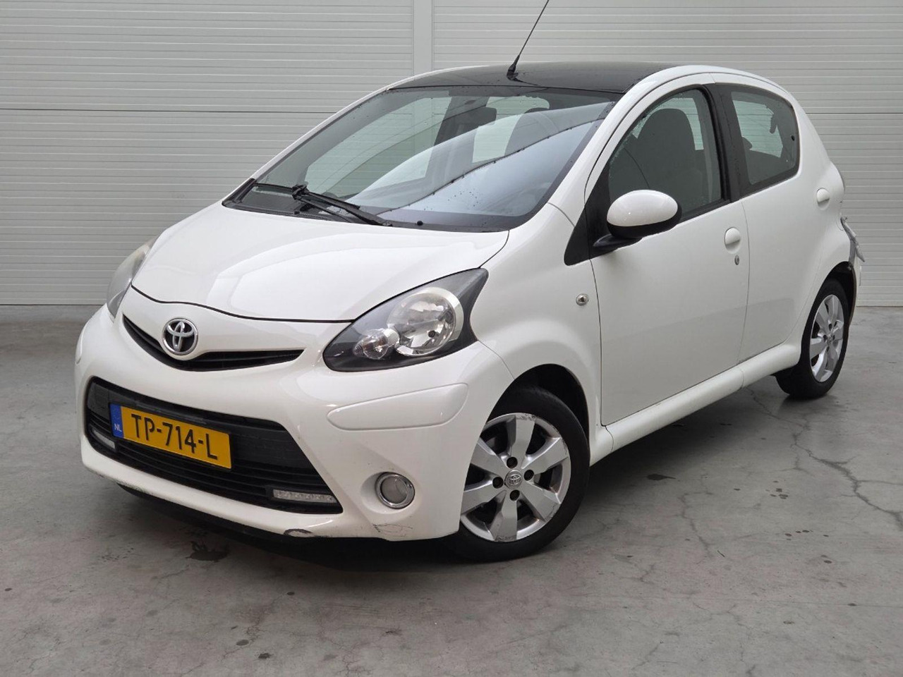 Toyota Aygo 1.0 VVT - i Now | 2014 | 131.940 km | TP714L | NAP: Geen oordeel - Hatchback/ Halvkombi: bild 1 Toyota Aygo 1.0 VVT - i Now | 2014 | 131.940 km | TP714L | NAP: Geen oordeel - Hatchback/ Halvkombi: bild 1