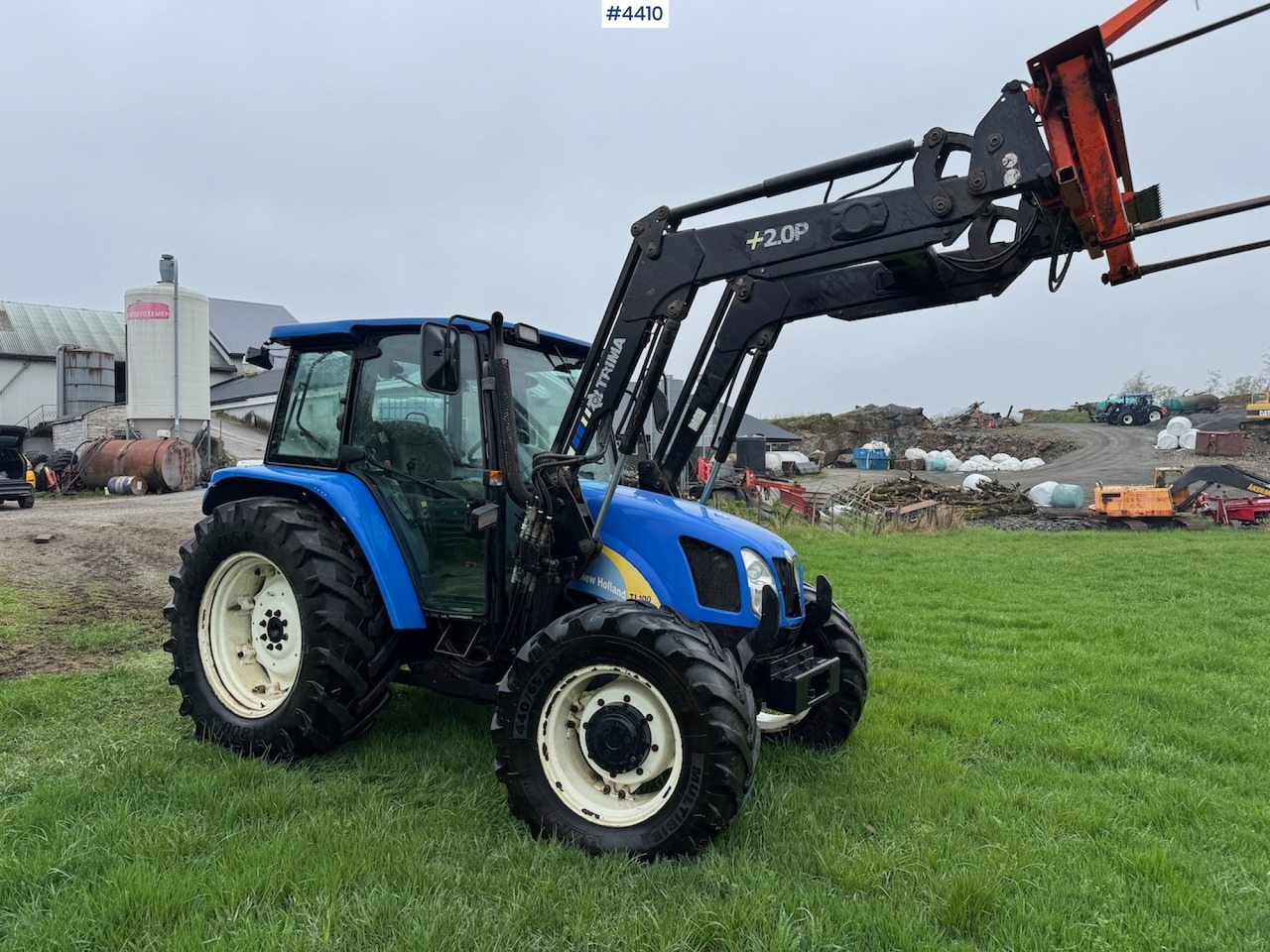 2006 New Holland TL100 A w/Front Loader. - Traktor: bild 2 2006 New Holland TL100 A w/Front Loader. - Traktor: bild 2