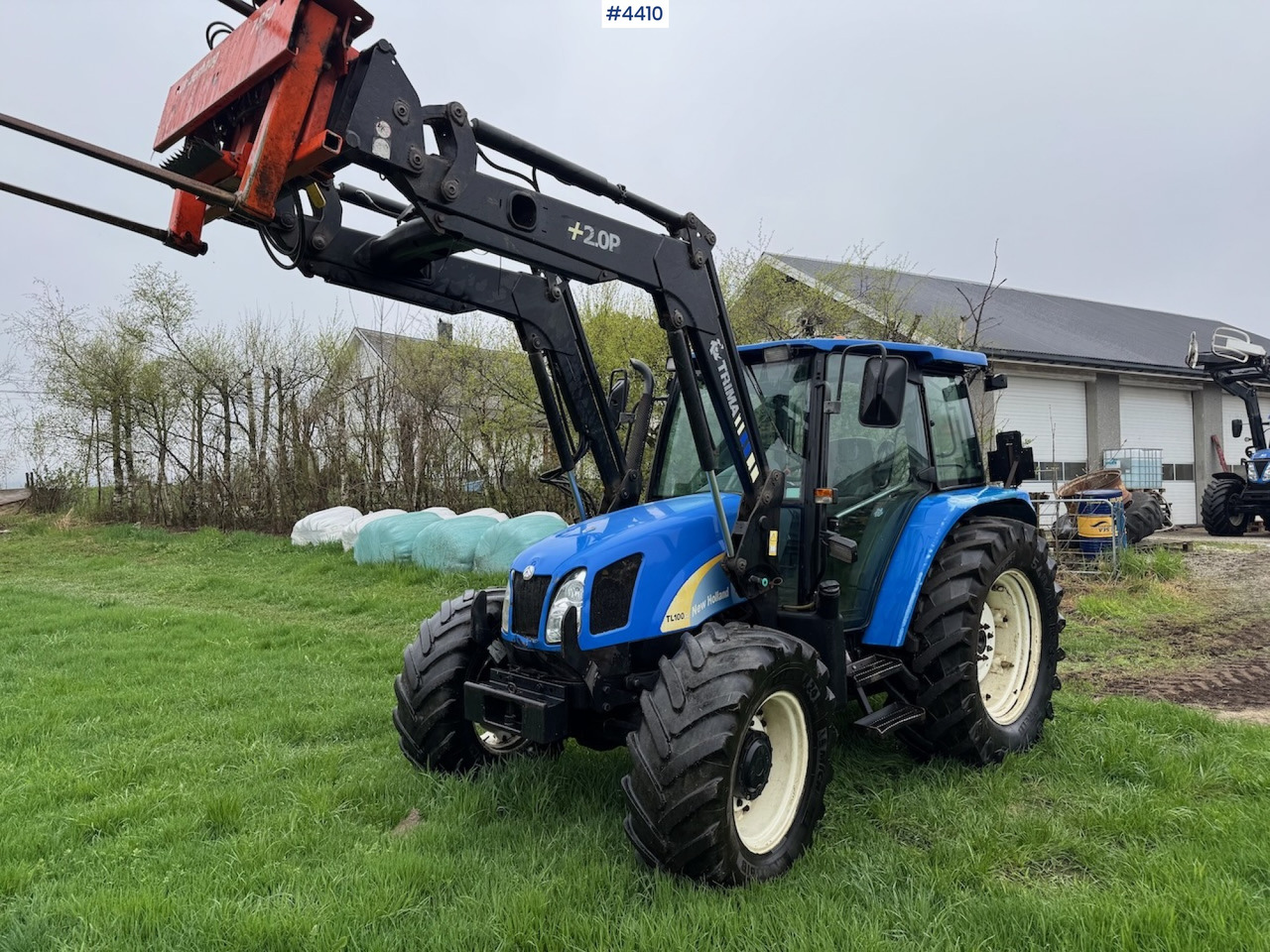 2006 New Holland TL100 A w/Front Loader. - Traktor: bild 1 2006 New Holland TL100 A w/Front Loader. - Traktor: bild 1