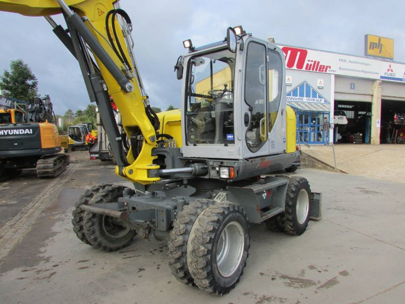 WACKER NEUSON EW 100 Mobilbagger Klima / AC / 59.500 EUR - Grävmaskin på däck: bild 2 WACKER NEUSON EW 100 Mobilbagger Klima / AC / 59.500 EUR - Grävmaskin på däck: bild 2