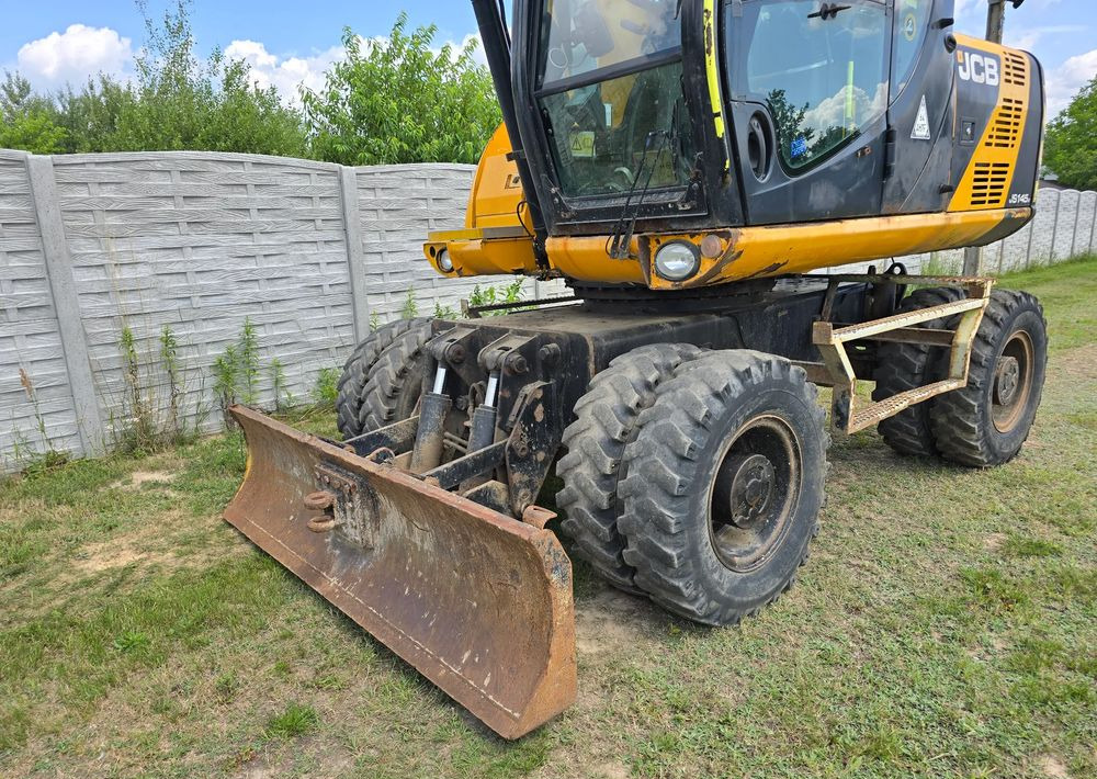 JCB - Grävmaskin på däck: bild 5 JCB - Grävmaskin på däck: bild 5