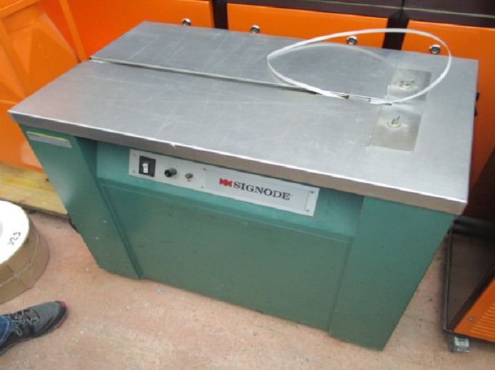 BANDEROLIERMASCHINE SIGNODE MS 220/50 - Förpackningsmaskin: bild 1 BANDEROLIERMASCHINE SIGNODE MS 220/50 - Förpackningsmaskin: bild 1
