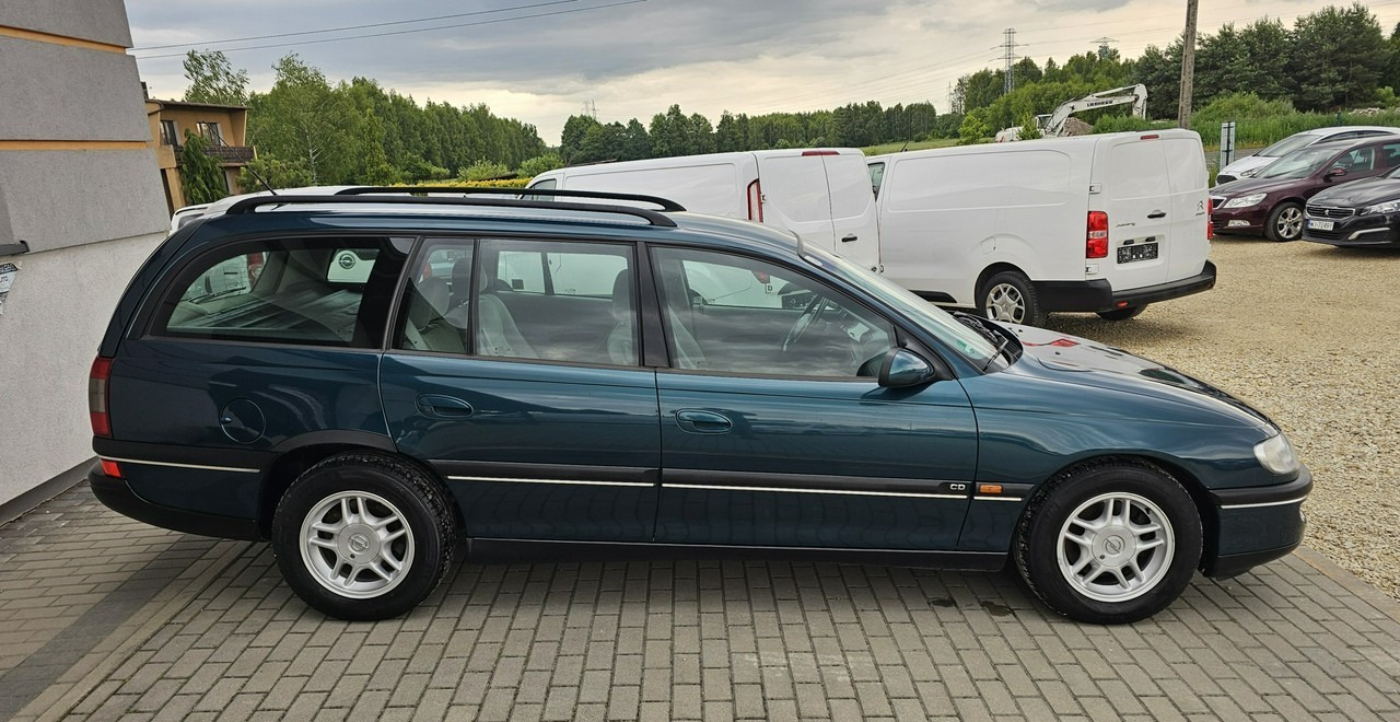Opel Omega B 2,5 v6 *automat* napęd tył *welury* - Personbil: bild 5 Opel Omega B 2,5 v6 *automat* napęd tył *welury* - Personbil: bild 5