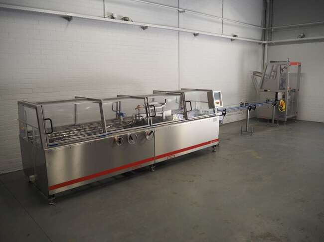 Schut Systems carton line EM60 - Förpackningsmaskin: bild 1 Schut Systems carton line EM60 - Förpackningsmaskin: bild 1