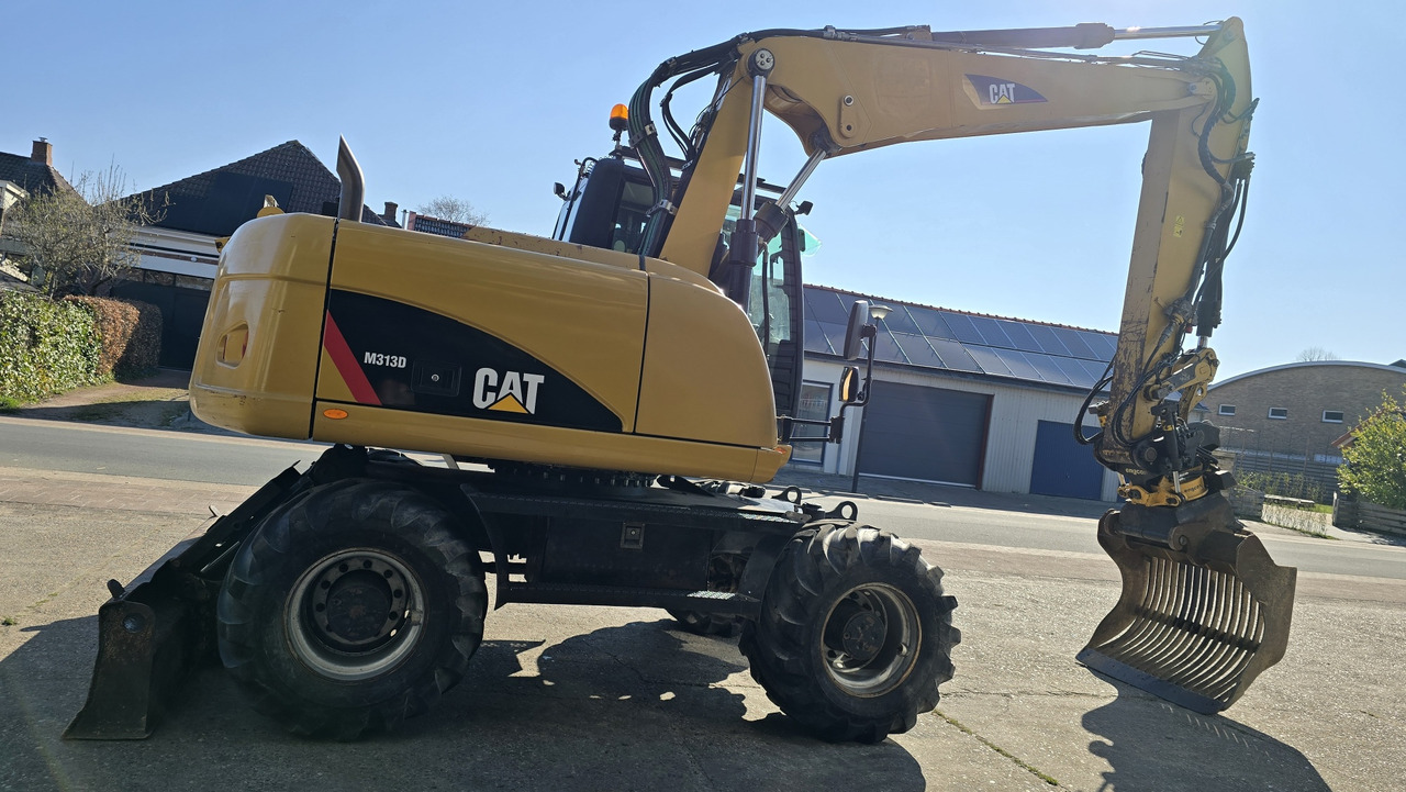 CATERPILLAR M313D - Grävmaskin på däck: bild 4 CATERPILLAR M313D - Grävmaskin på däck: bild 4