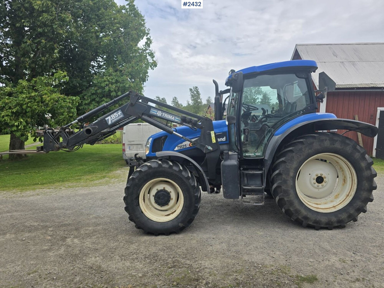 New Holland TS 125A med Frontlastare - Traktor: bild 1 New Holland TS 125A med Frontlastare - Traktor: bild 1