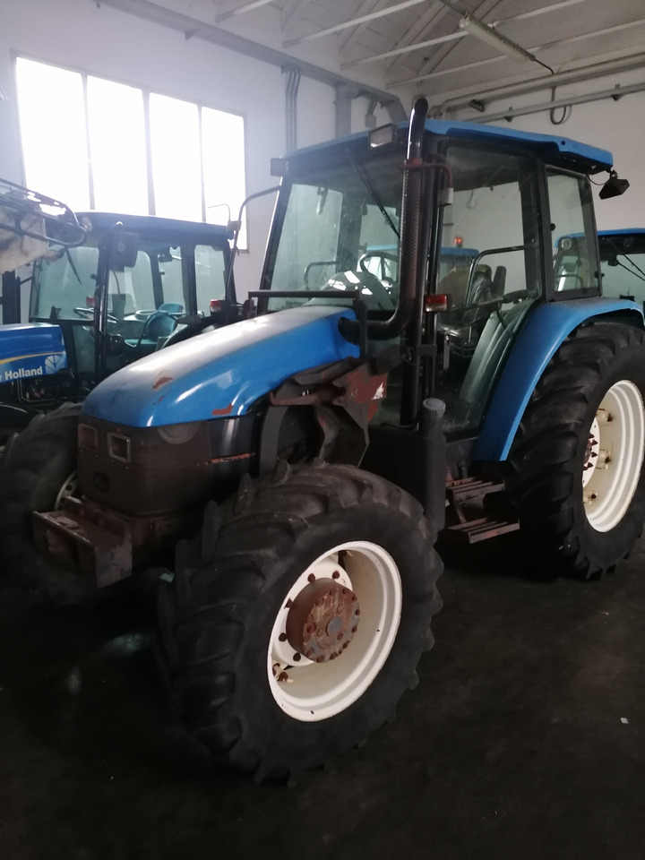 NEW HOLLAND TL 90 - Traktor: bild 2 NEW HOLLAND TL 90 - Traktor: bild 2