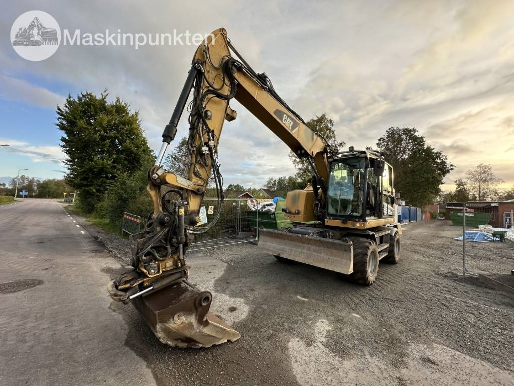 CAT M 317 - Grävmaskin på däck: bild 2 CAT M 317 - Grävmaskin på däck: bild 2