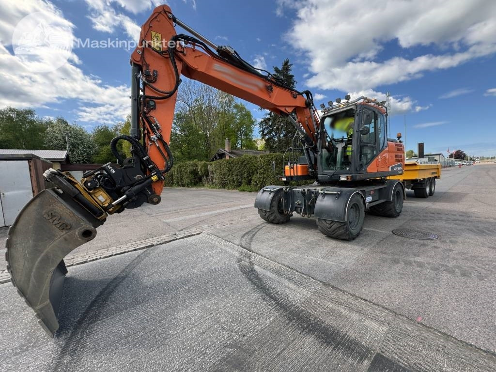 Doosan DX 160 W - Grävmaskin på däck: bild 1 Doosan DX 160 W - Grävmaskin på däck: bild 1