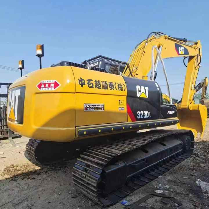 Used Digger CAT 323DL Construction Machinery Construction Digger Used CAT 323DL Cheap Excavator - Bandgrävare: bild 4 Used Digger CAT 323DL Construction Machinery Construction Digger Used CAT 323DL Cheap Excavator - Bandgrävare: bild 4