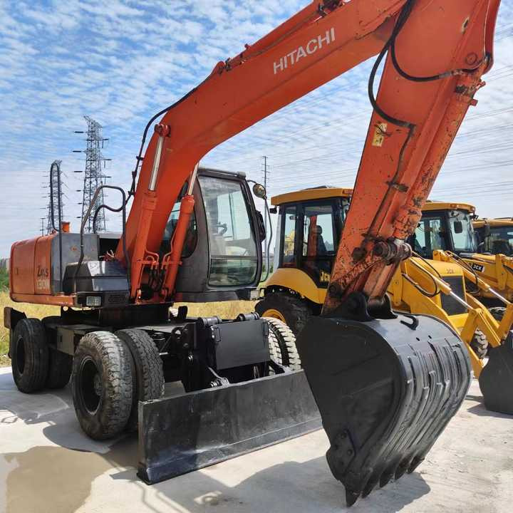Used Japan Original Brand Hitachi Zx 130w Wheel Excavator Hitachi Zx120 130 200 Excavator for Sale - Grävmaskin: bild 2 Used Japan Original Brand Hitachi Zx 130w Wheel Excavator Hitachi Zx120 130 200 Excavator for Sale - Grävmaskin: bild 2