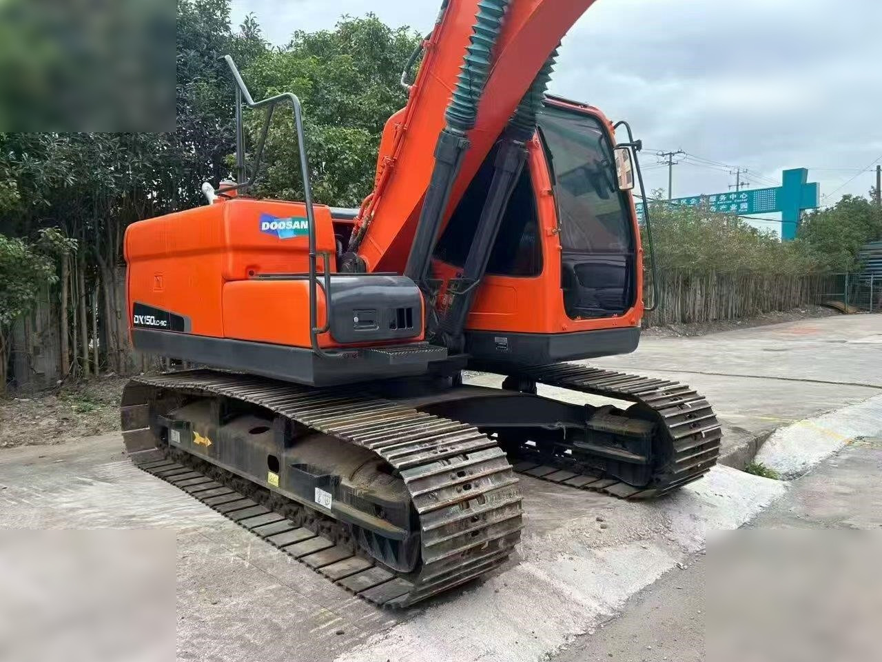DOOSAN DX150W-9C - Grävmaskin på däck: bild 1 DOOSAN DX150W-9C - Grävmaskin på däck: bild 1