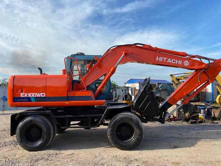 Used Hitachi Ex100WD Wheel Excavator for Sale Japan Made Hitachi Ex100wd Wheeled Excavator for Sale - Grävmaskin på däck: bild 2 Used Hitachi Ex100WD Wheel Excavator for Sale Japan Made Hitachi Ex100wd Wheeled Excavator for Sale - Grävmaskin på däck: bild 2