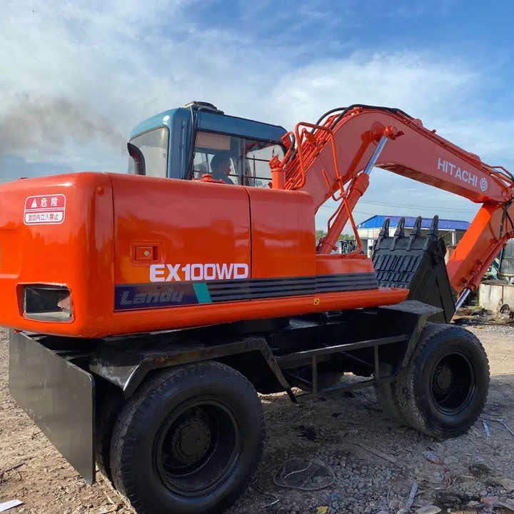 Used Hitachi Ex100WD Wheel Excavator for Sale Japan Made Hitachi Ex100wd Wheeled Excavator for Sale - Grävmaskin på däck: bild 1 Used Hitachi Ex100WD Wheel Excavator for Sale Japan Made Hitachi Ex100wd Wheeled Excavator for Sale - Grävmaskin på däck: bild 1