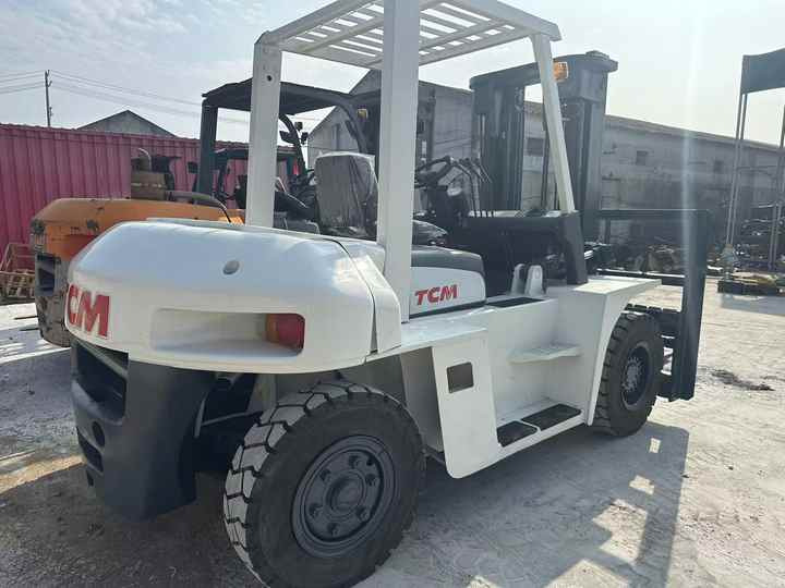 High Quality TCM 7 Ton with Hydraulic Distance Adjustment Used Forklift in Stock Used tcm Forklift 7 Ton Used tcm Fd70 Forklift - Motviktstruck: bild 2 High Quality TCM 7 Ton with Hydraulic Distance Adjustment Used Forklift in Stock Used tcm Forklift 7 Ton Used tcm Fd70 Forklift - Motviktstruck: bild 2