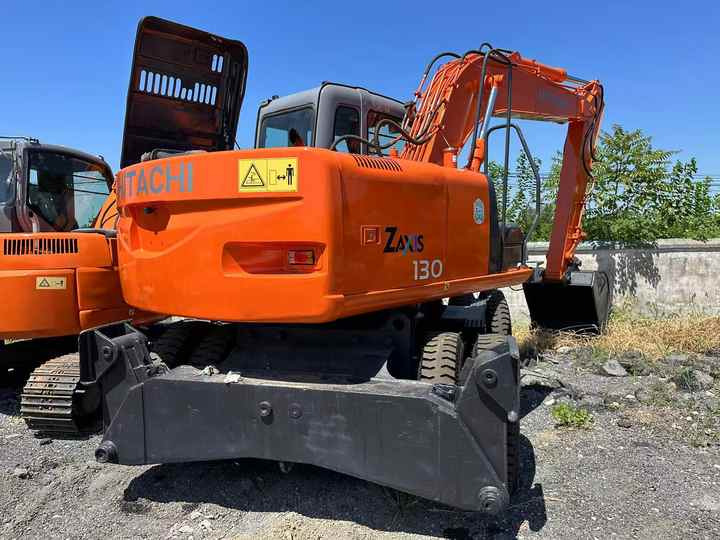 Used Wheel Excavator Hitachi ZX 130W Made in Japan 13ton Hitachi Zx130w Wheel Excavator Price Used Hitachi Zx130 Excavator SALE - Grävmaskin: bild 2 Used Wheel Excavator Hitachi ZX 130W Made in Japan 13ton Hitachi Zx130w Wheel Excavator Price Used Hitachi Zx130 Excavator SALE - Grävmaskin: bild 2
