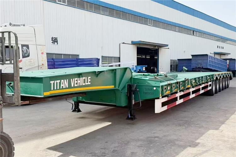 TITAN 6 Axle 80 Ton Low Loader Semi Trailer for Sale In Zambia - Låg lastare semitrailer: bild 1 TITAN 6 Axle 80 Ton Low Loader Semi Trailer for Sale In Zambia - Låg lastare semitrailer: bild 1