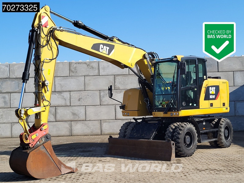 Caterpillar M314 F - Grävmaskin på däck: bild 1 Caterpillar M314 F - Grävmaskin på däck: bild 1