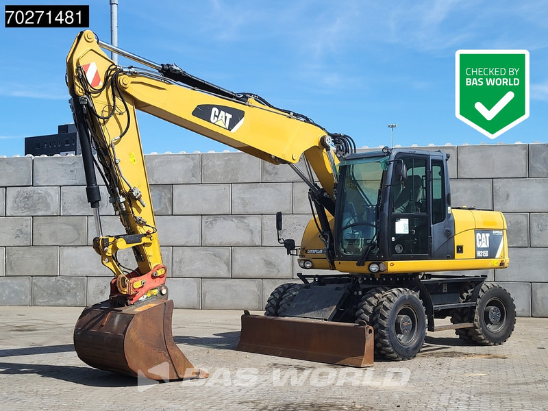 Caterpillar M315 D - Grävmaskin på däck: bild 1 Caterpillar M315 D - Grävmaskin på däck: bild 1