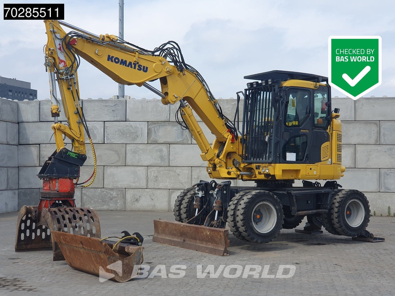 Komatsu PW118 MR -11 - Grävmaskin på däck: bild 1 Komatsu PW118 MR -11 - Grävmaskin på däck: bild 1