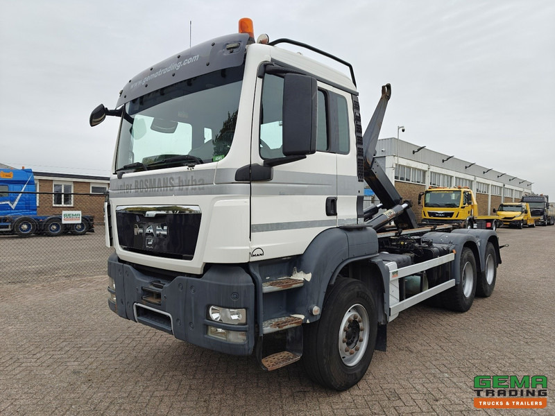 MAN TGS-TGX 26.440 6x4 Dagcabine Euro5 - AJK 20T HaakarmSysteem - Volledig Bladgeveerd - Naafreductie - Handgeschakeld - Lastväxlare lastbil: bild 1 MAN TGS-TGX 26.440 6x4 Dagcabine Euro5 - AJK 20T HaakarmSysteem - Volledig Bladgeveerd - Naafreductie - Handgeschakeld - Lastväxlare lastbil: bild 1