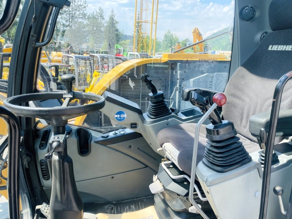 Liebherr A910 Compact (4025) - Grävmaskin på däck: bild 5 Liebherr A910 Compact (4025) - Grävmaskin på däck: bild 5