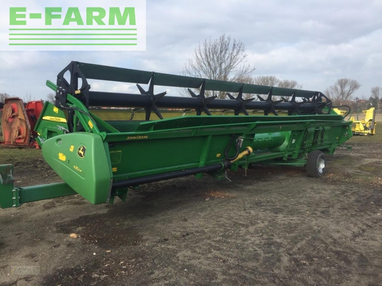 John Deere 630r mit sonnenblumenvorsatz - Traktor: bild 2 John Deere 630r mit sonnenblumenvorsatz - Traktor: bild 2
