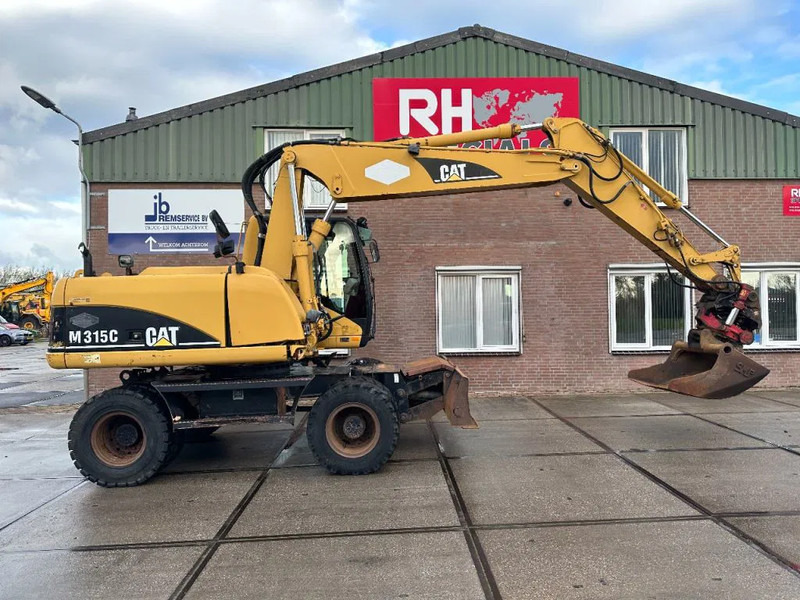 Caterpillar M315C WITH ROTOTILT, CE - Grävmaskin på däck: bild 2 Caterpillar M315C WITH ROTOTILT, CE - Grävmaskin på däck: bild 2