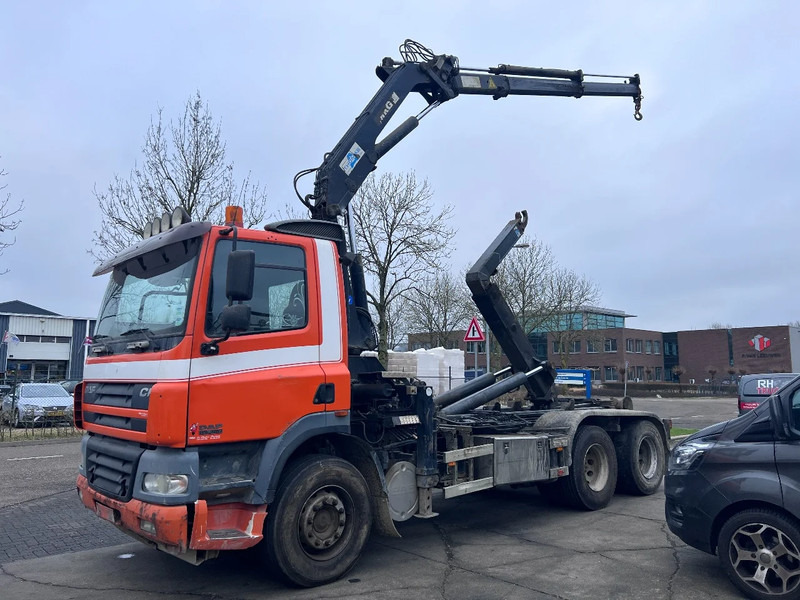 DAF CF 85.380 6X2 + MKG 141 A2 CRANE + 20 TON HOOKLIFT - EURO 3 - MANUAL GEAR - 10 TYRES - Lastväxlare lastbil, Kranbil: bild 1 DAF CF 85.380 6X2 + MKG 141 A2 CRANE + 20 TON HOOKLIFT - EURO 3 - MANUAL GEAR - 10 TYRES - Lastväxlare lastbil, Kranbil: bild 1