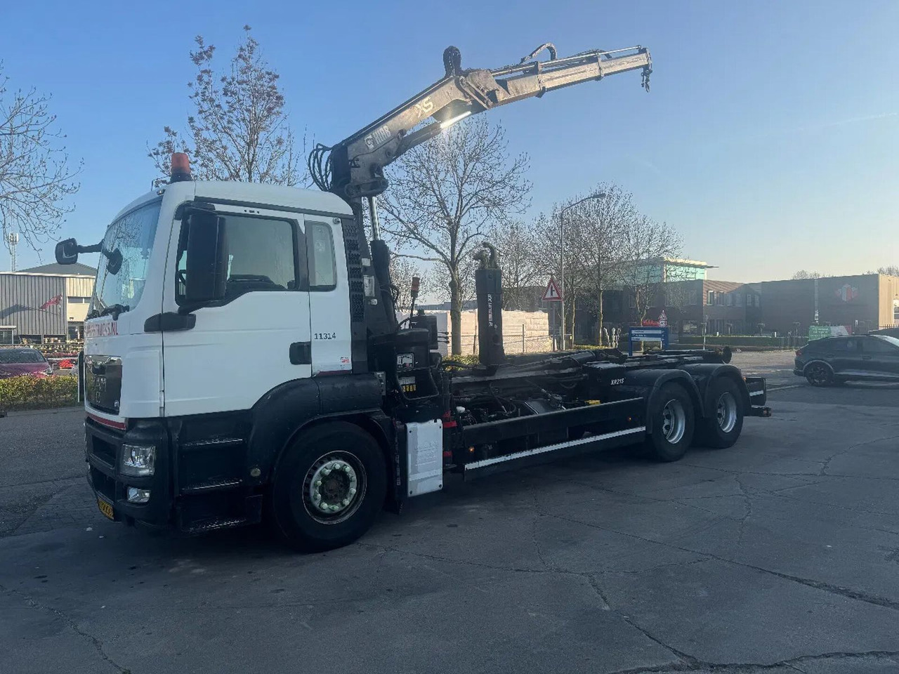 MAN TGS 26.360 6X4 VDL 21T HOOK + HIAB 122 + REMOTE - Lastväxlare lastbil: bild 1 MAN TGS 26.360 6X4 VDL 21T HOOK + HIAB 122 + REMOTE - Lastväxlare lastbil: bild 1
