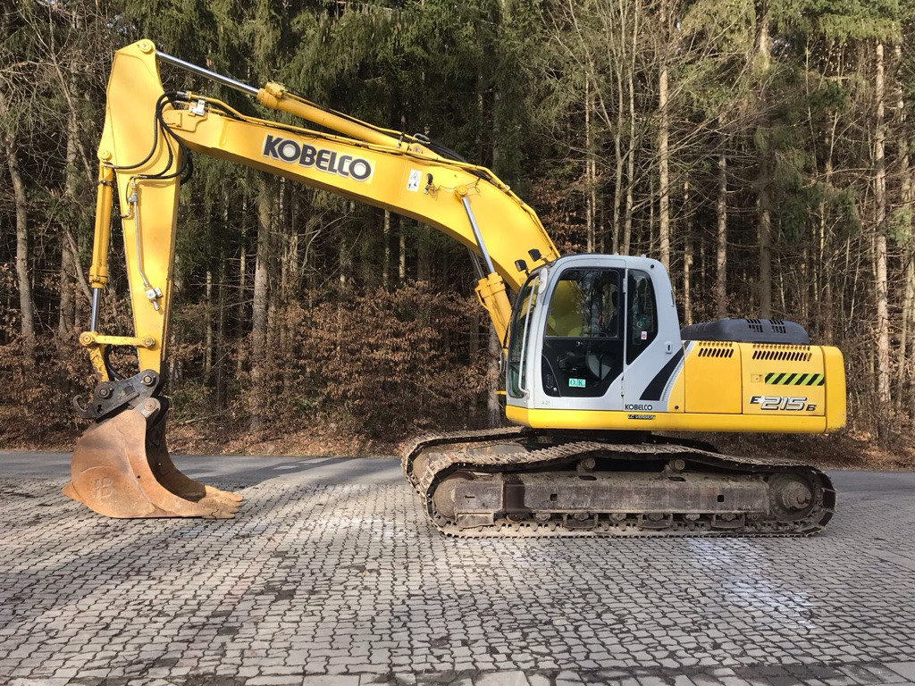 NEW HOLLAND E 215 B - Bandgrävare: bild 1 NEW HOLLAND E 215 B - Bandgrävare: bild 1