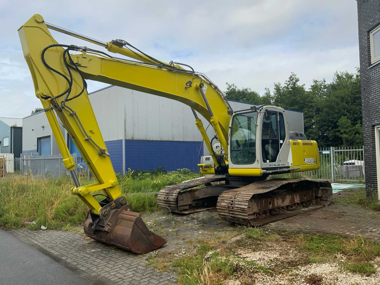 New Holland E 215B - Bandgrävare: bild 1 New Holland E 215B - Bandgrävare: bild 1